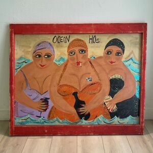 Ocean Hos.” Painted on wood